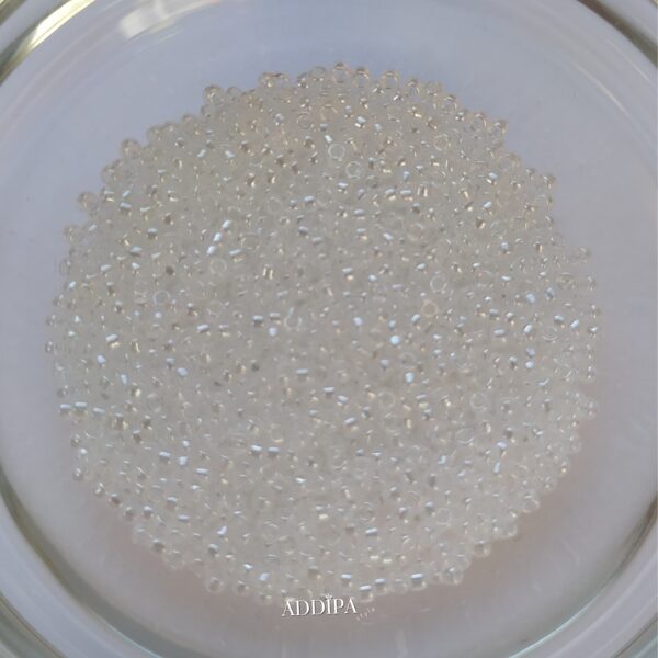TOHO size 15 seed beads 10 grams, color-transparent and slightly white.
